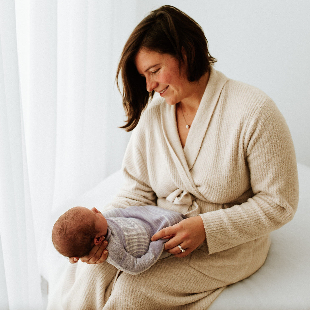 Best Swaddle for Newborns: Comparing Swaddelini, Ollie, HALO, and Love to Dream