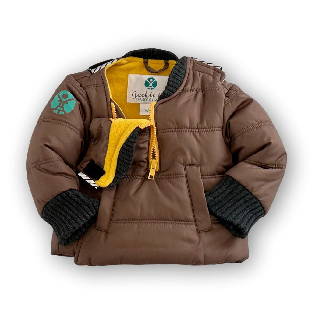 Snickerdoodle/Brown
Brown carseat coat is displayed on a white background.  The coat is partially unzipped showing the mustard yellow interior.