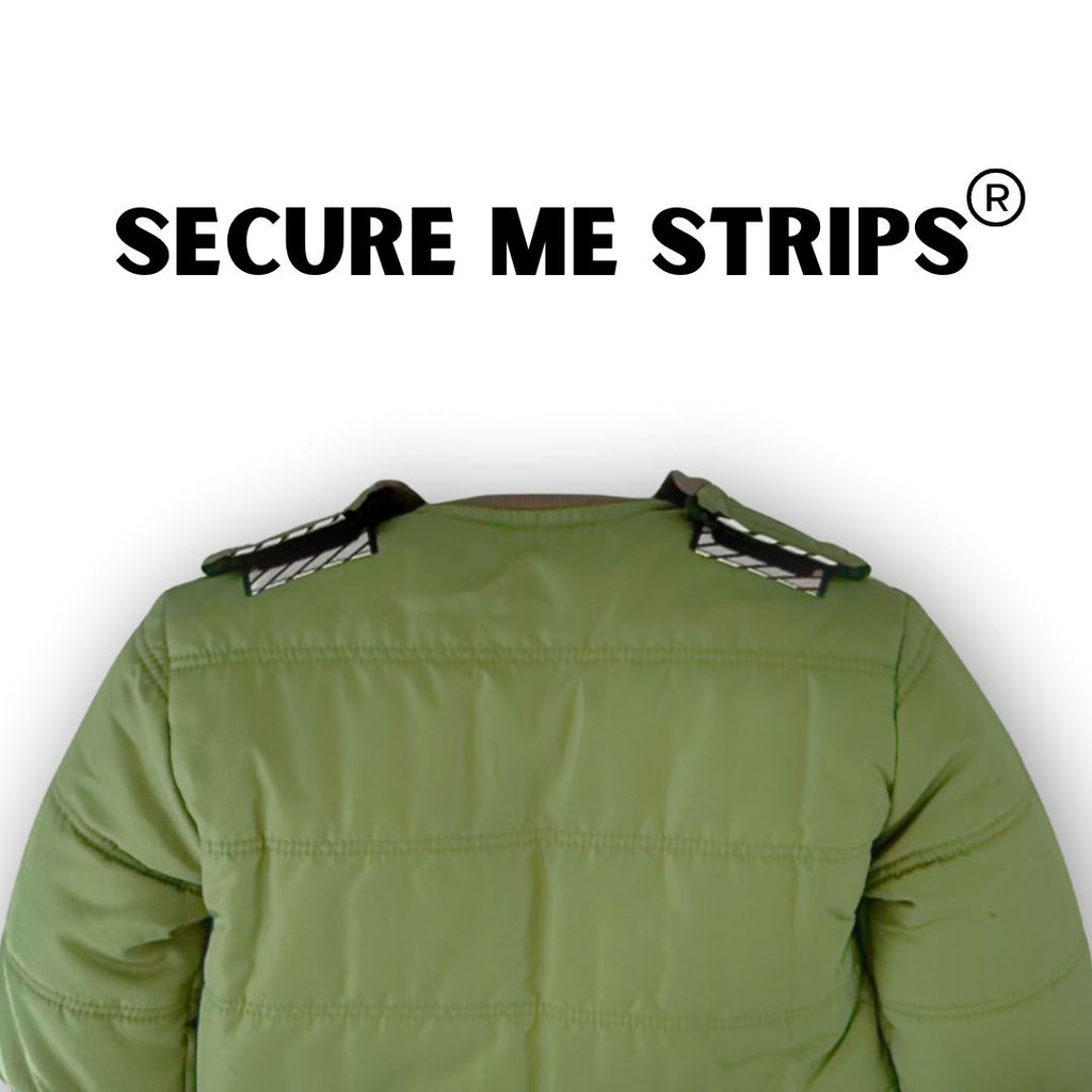 Puff/Green 
green car seat coat shown on a white background.  The coat is displayed backwards to show the velcro secure me strips on top of the shoulders. 