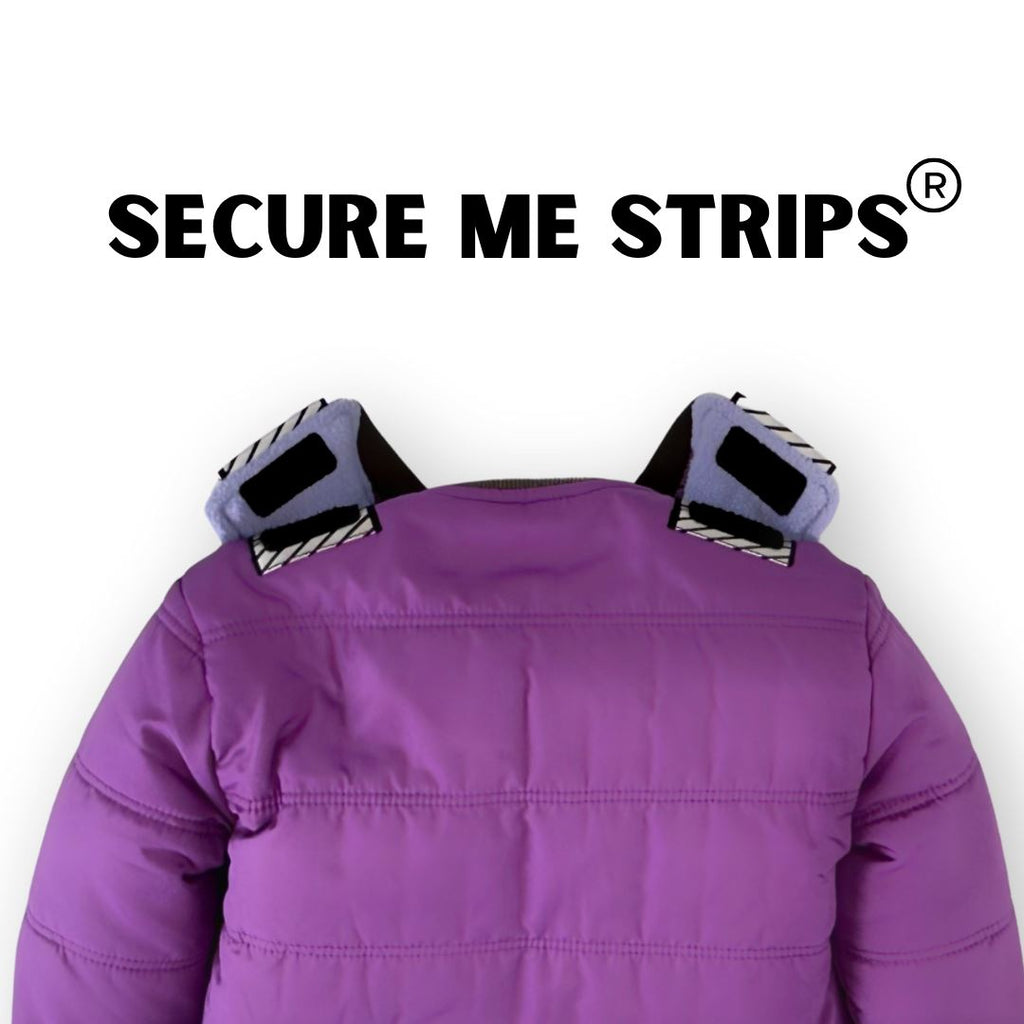 Sparkalot/Purple
Purple car seat coat shown on a white background.  The coat is displayed backwards to show the velcro secure me strips on top of the shoulders. The strips are both unsecured