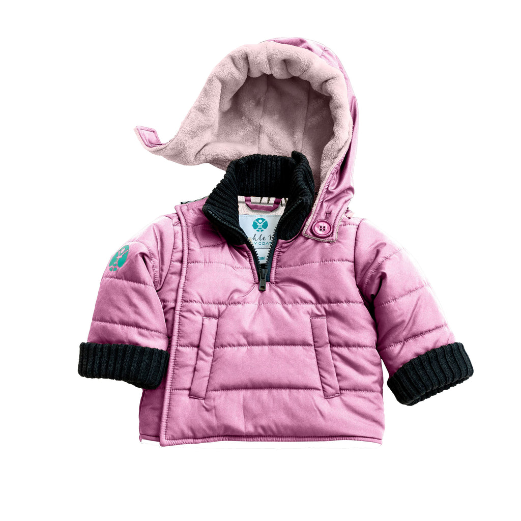 Do-Rae-Mi/Pink
Pink hooded car seat coat with charcoal grey cuffs is displayed on a white background.  The hood is partially detached and has a pink sherpa interior. 